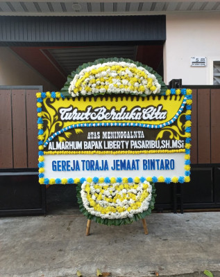 Papan Bunga Duka di Takofi